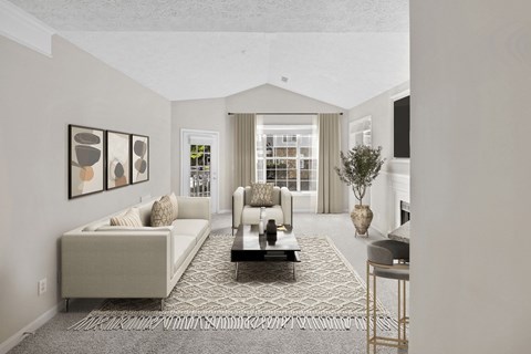 A living room with a white couch and a coffee table at Elan at Mallard Creek Apartment Homes, Charlotte, 28269