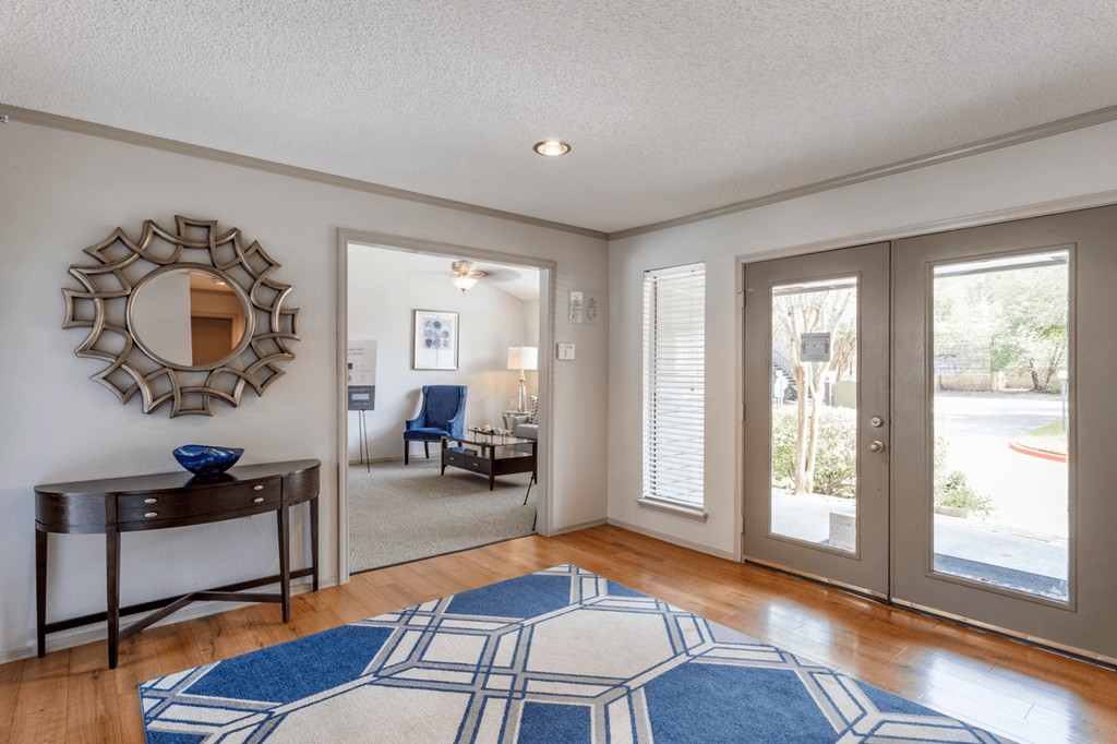 a living room with sliding glass doors to a patio