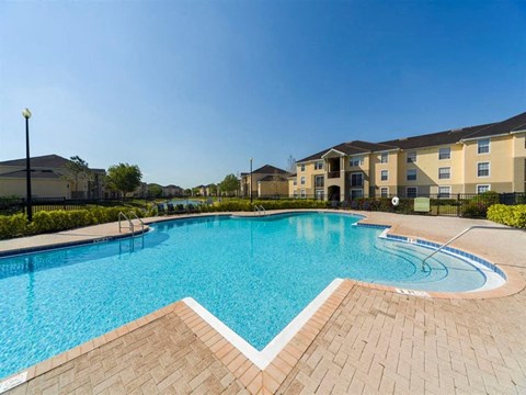 Resort Style Swimming Pool with Building Exterior in the Background