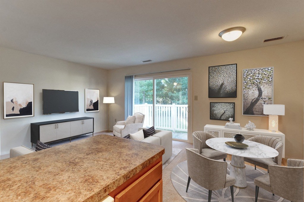 a living room with a couch and a table