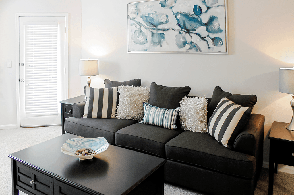 a living room with a couch and a coffee table
