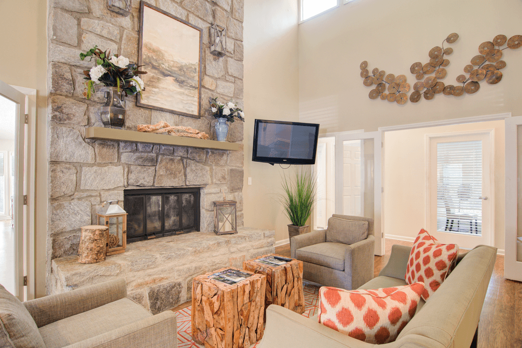 a living room with a couch and a tv