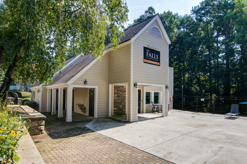 a white building with a sign on the side of it