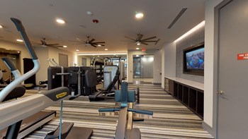 Entry to fitness center facing water bottle station and storage area - Photo Gallery 98