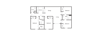 A floor plan of a house with a laundry room, kitchen, dining room, and multiple bedrooms.