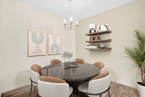 a dining room with a table and chairs