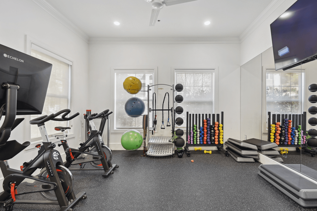 the gym at the flats at big tex apartments