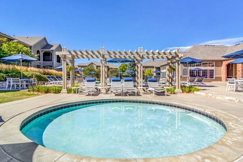 Wading Pool Next to Pergola with Lounge Chairs