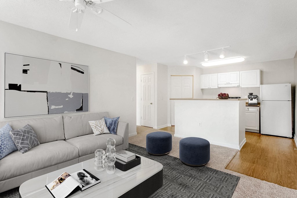 Living Room With Kitchen View at The Grayson Apartment Homes, North Carolina