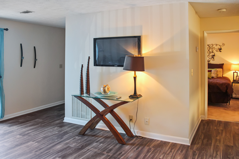 furnished living room with hardwood-style flooring