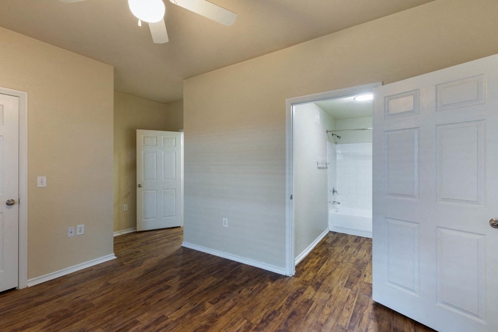 Living room with hallway and hardwood floors