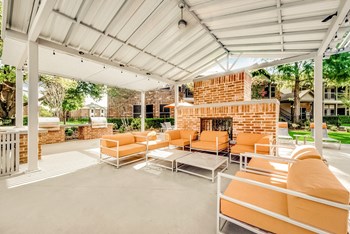 outside seating area with table and outside chairs.