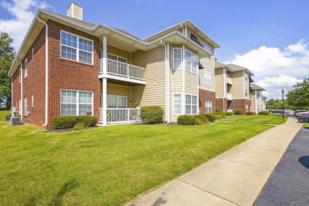 our apartments are located in a quiet neighborhood with a green lawn