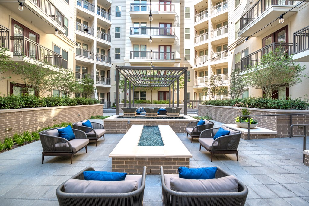 Outdoor sitting area surrounding a water fixture