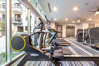 Fitness center area facing a stair climber and exterior windows - Photo Gallery 96