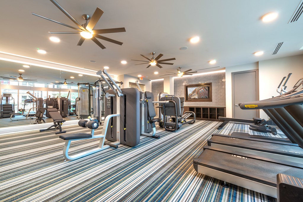 Fitness center with weights and treadmills