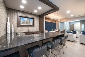 Resident kitchen inside clubhouse facing the bar area - Photo Gallery 24