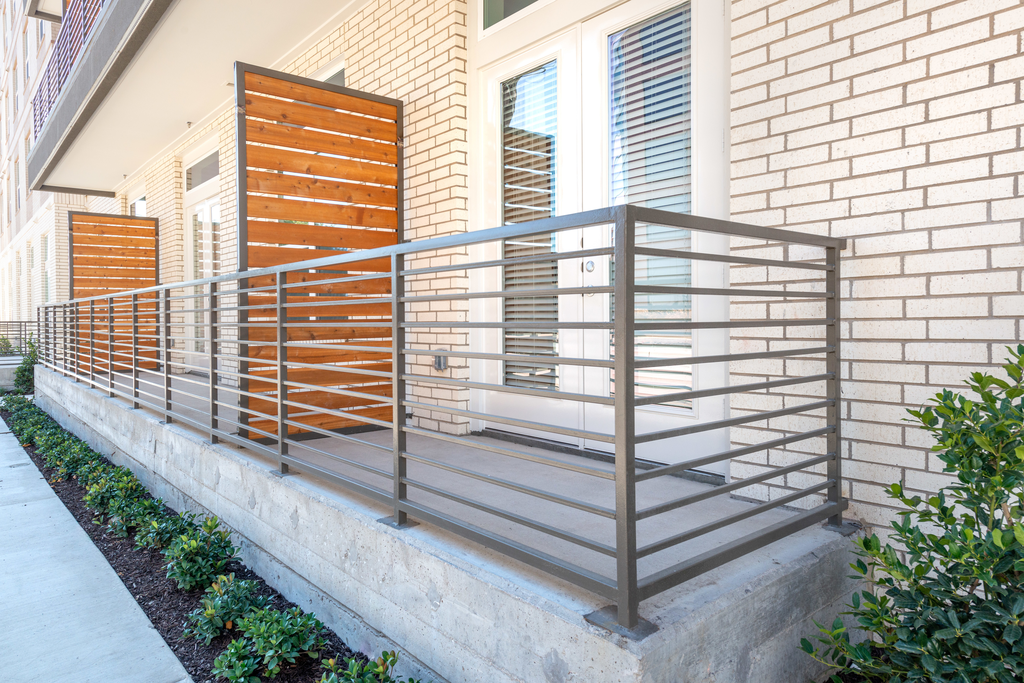Private patio exterior with native landscape
