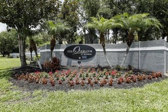 Monument Sign of property with landscaping