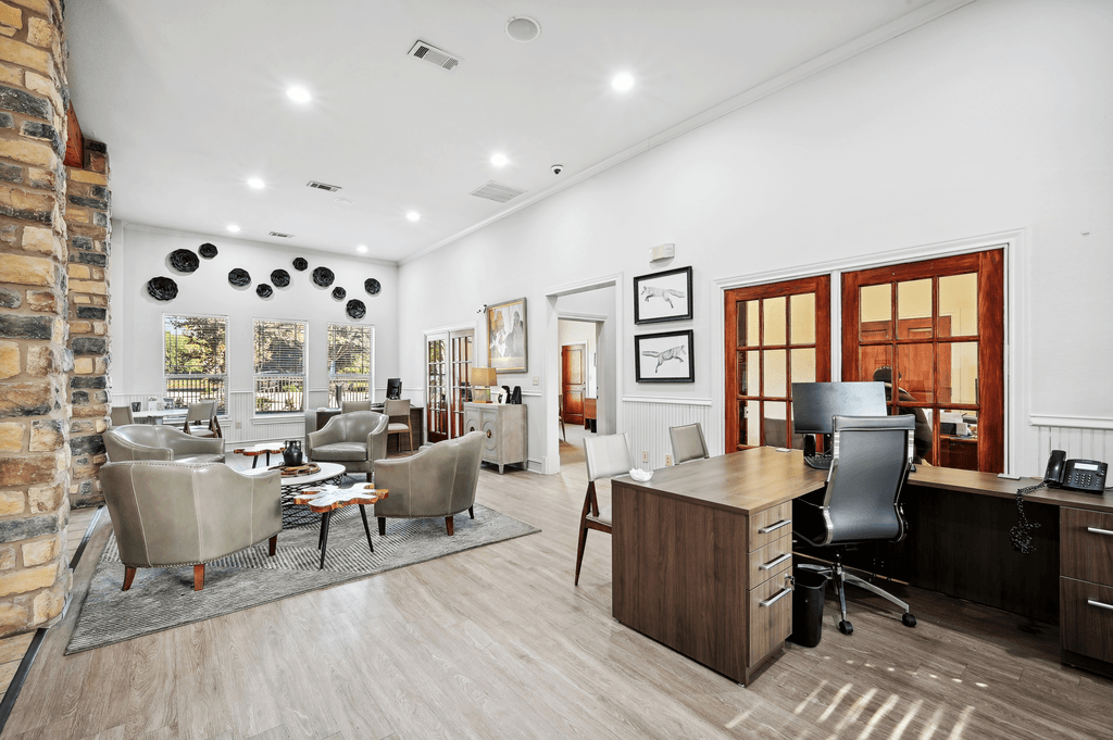 the living room is open to the dining room and kitchen