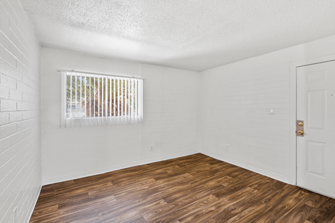 bedroom with hardwood floors at Bella Vista Apartments, Phoenix Arizona