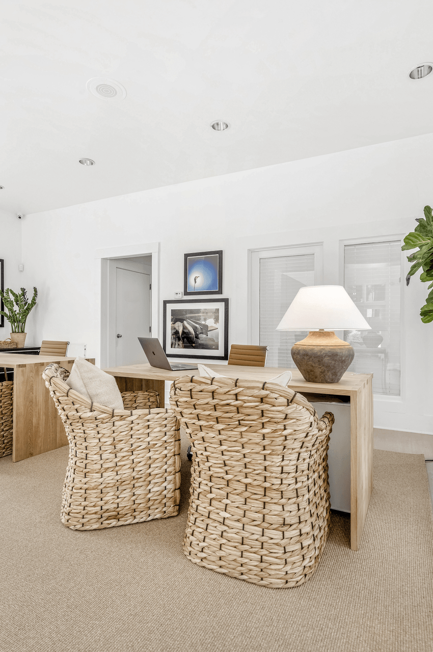 A room with a white wall and a television on a shelf at Paces Pointe Apartment Homes, North Carolina