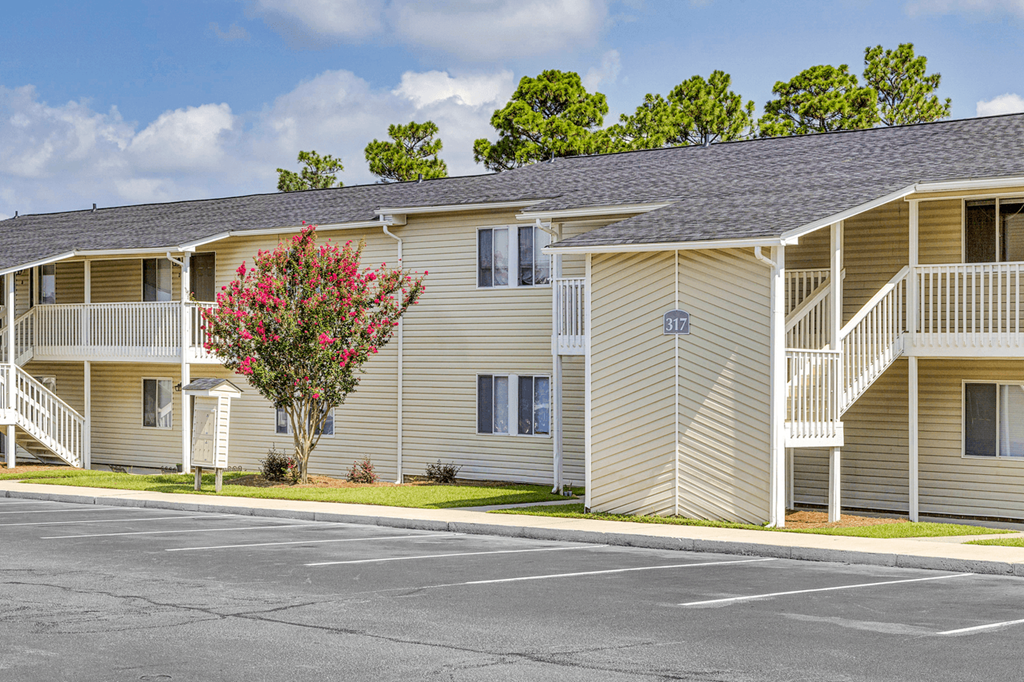 our apartments are equipped with a parking lot and balconies at Patriot Point Apartment Homes, North Carolina, 28390