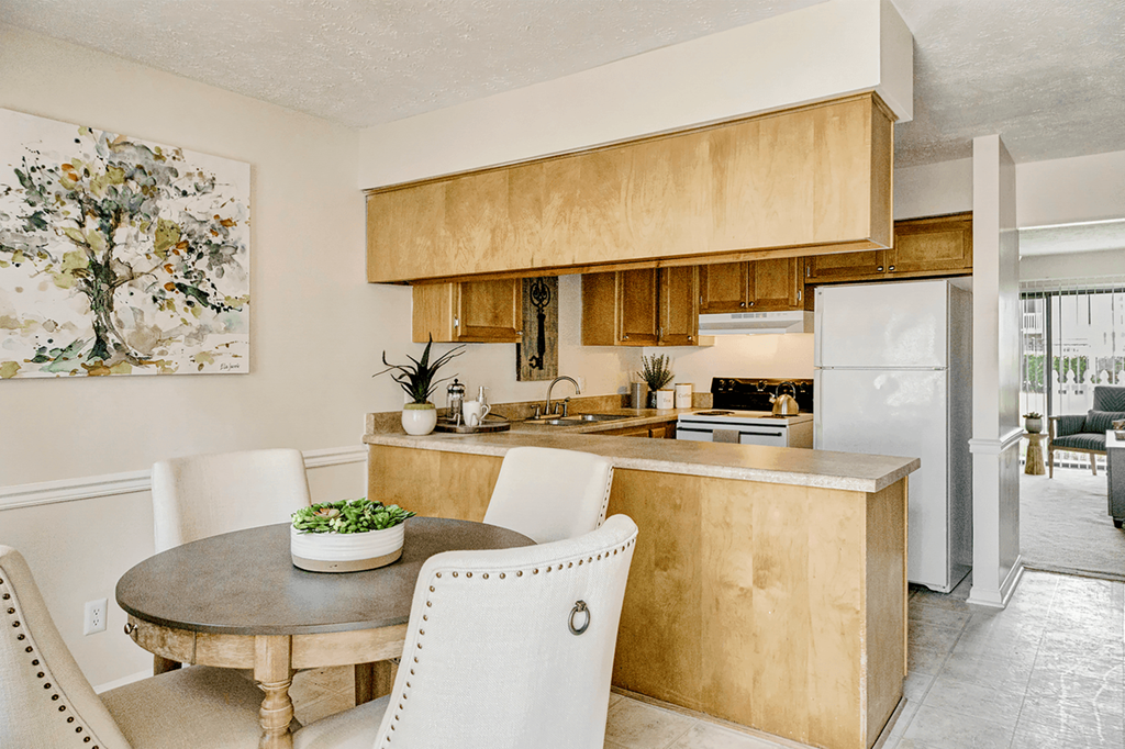 a kitchen and dining room at Patriot Point Apartment Homes, Spring Lake 
