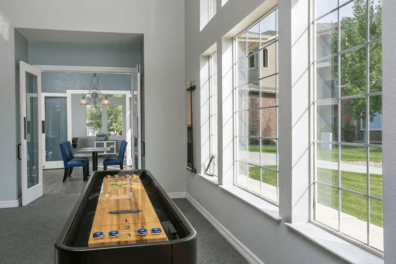 a game room with a foosball table