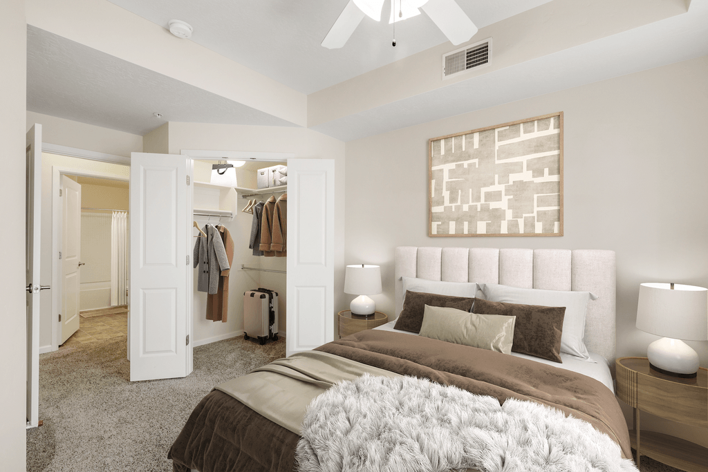 a bedroom with a bed and a closet
