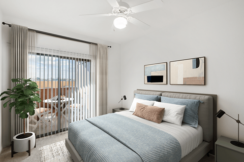 bedroom with light fitted fan at San Fernando Apartments, Mesa, AZ 85205