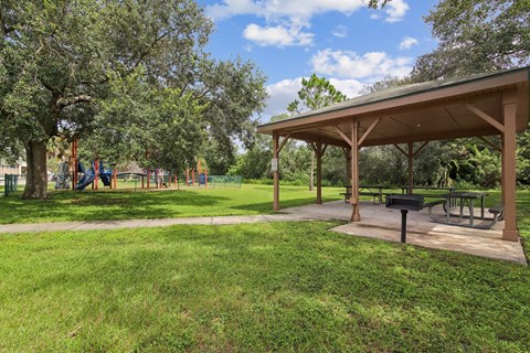 A park with a pavilion and a playground.