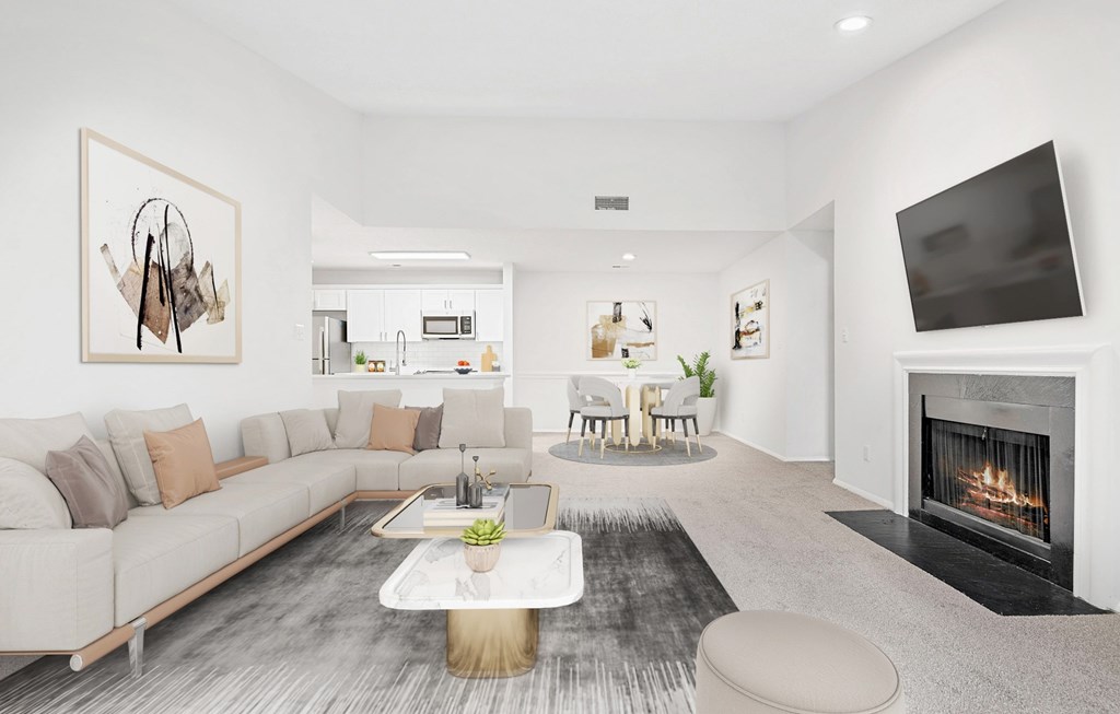 A modern living room with a fireplace and a television. at Southpark Commons Apartment Homes, Charlotte, NC