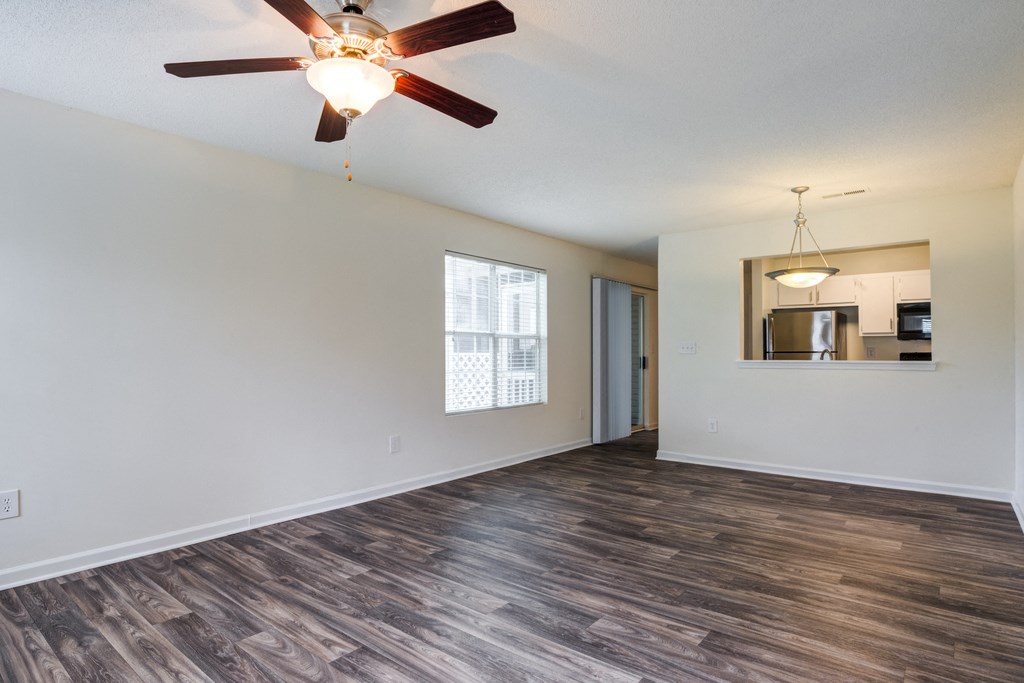 Living room with wood floors and ceiling fan