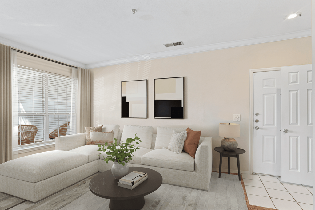 a living room with two couches and a coffee table