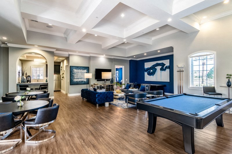 the preserve at ballantyne commons community room with pool table and couches