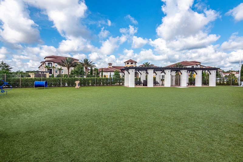 a large lawn in front of a mansion