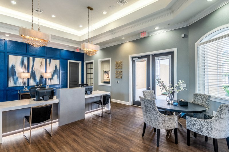 a dining room with a table and chairs