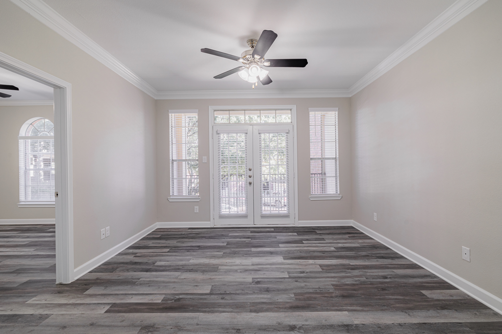 living room with hardwood-style flooring and ceiling fan