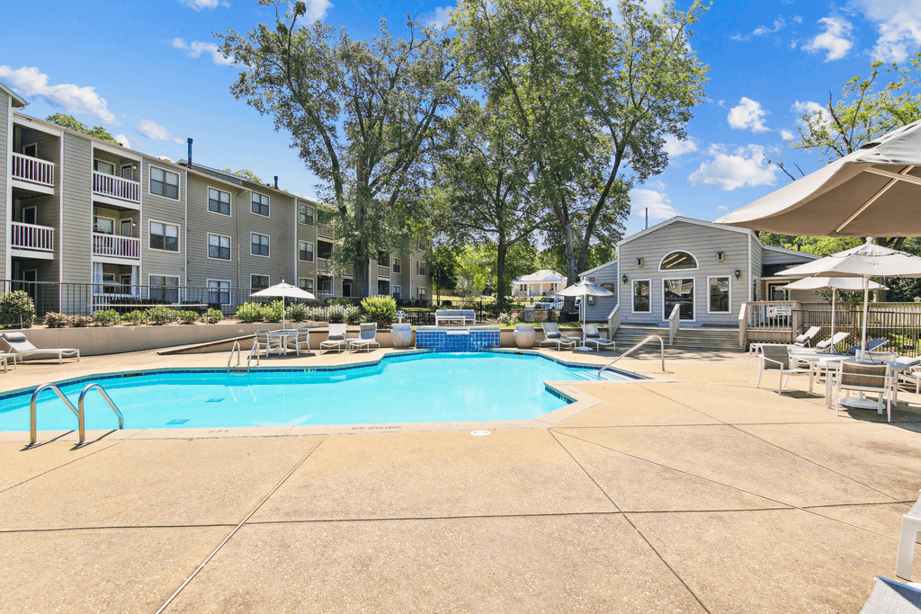 our apartments have a pool and lounge areas with umbrellas