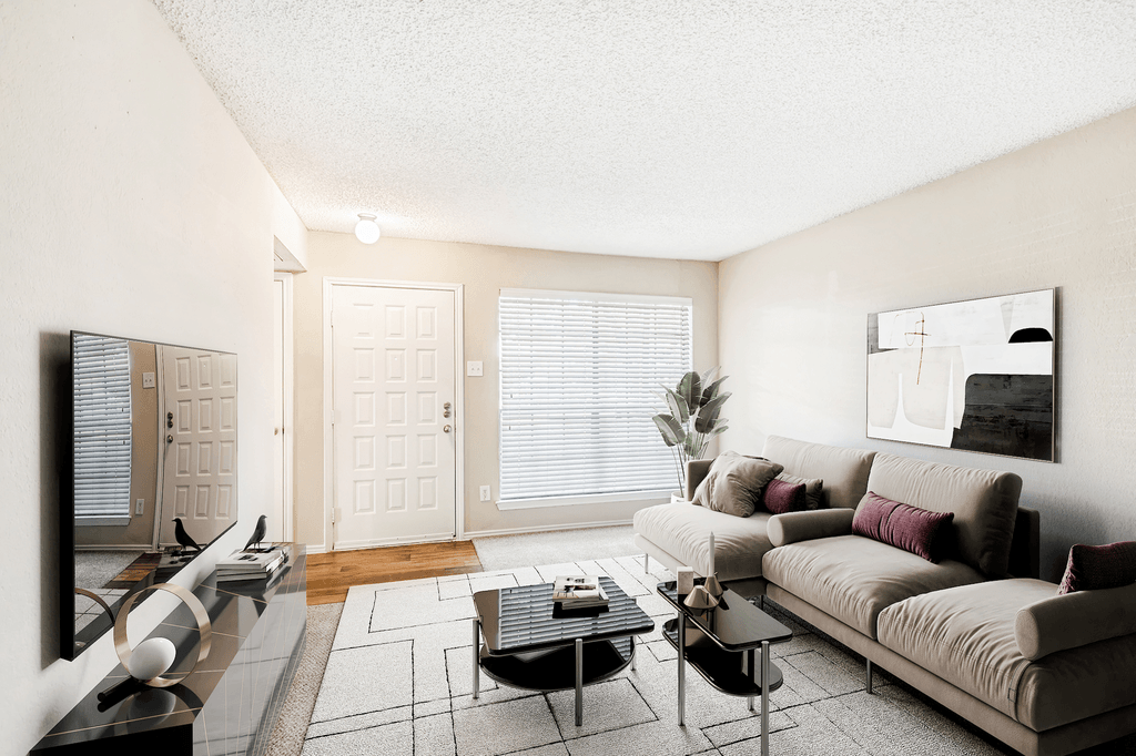 Virtually staged livingroom with carpet, accent rug, coffee tables, wall mounted television, front door and large window with blinds