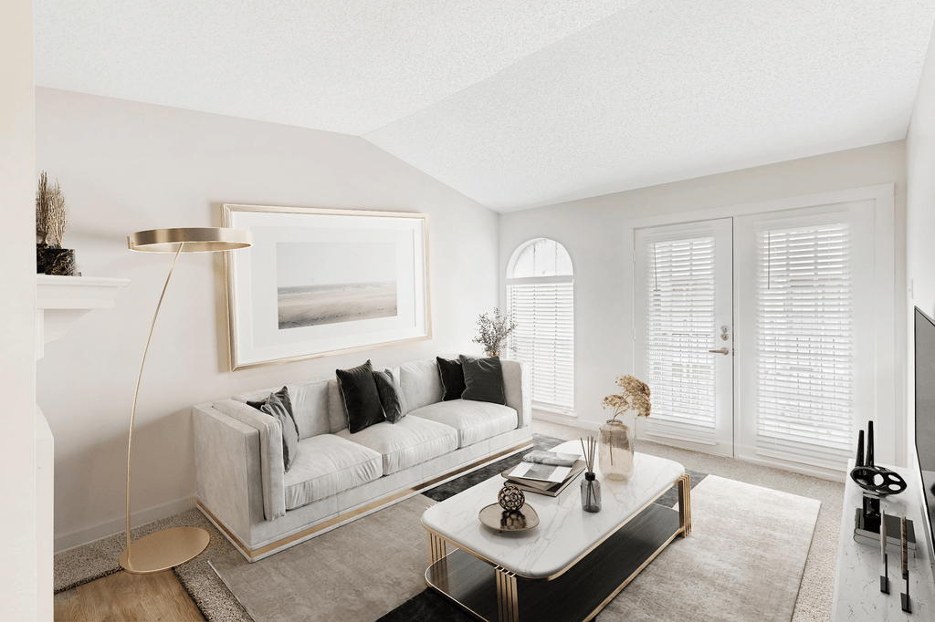 Virtually staged livingroom with carpet, accent rug, couch, coffee table, standing light, wall mounted television, doors and windows with blinds