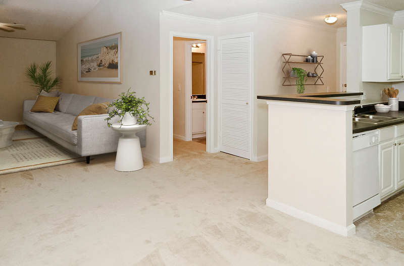 a living room with a couch and a table