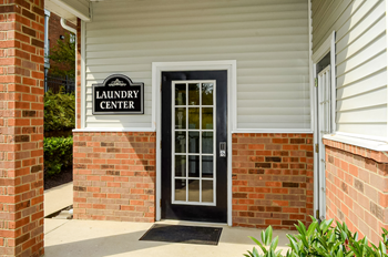 a door with a laundry center sign on it