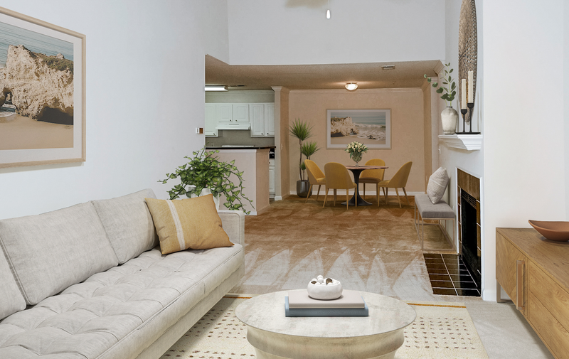 a living room with a couch and a table