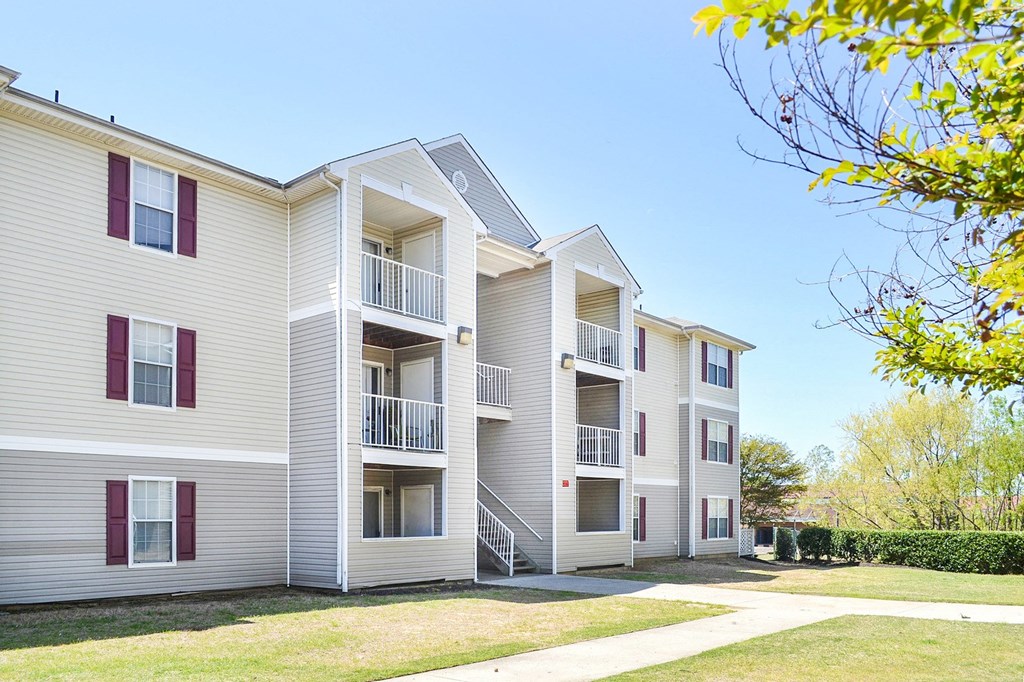 Building Exterior surrounded by shrubbery and trees