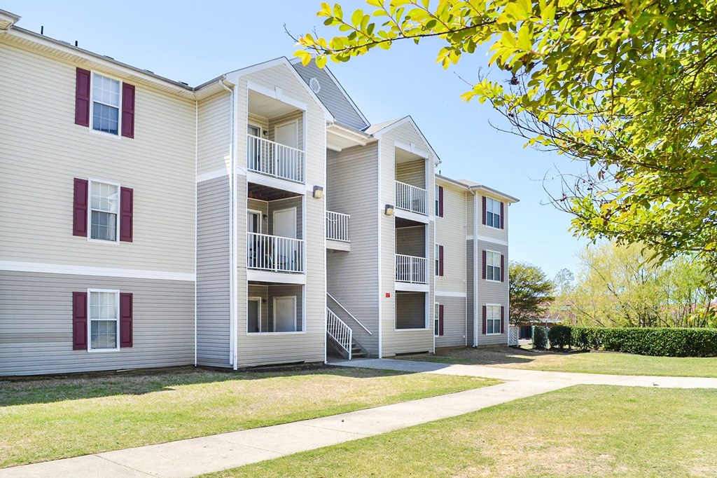 Building Exterior surrounded by shrubbery and trees