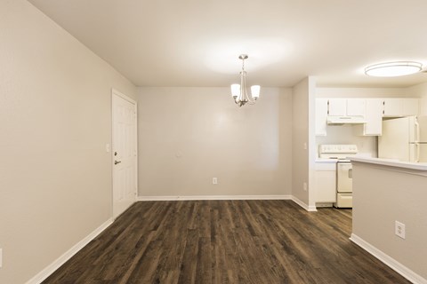 A dining room with wooden floors