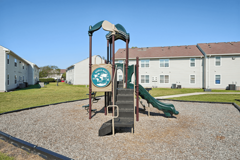 playground with apartments in the background
