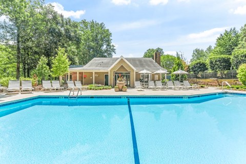 the pool at the whispering winds apartments in pearland, tx